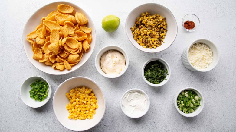 tortilla chips, corn, cheese, and other ingredients