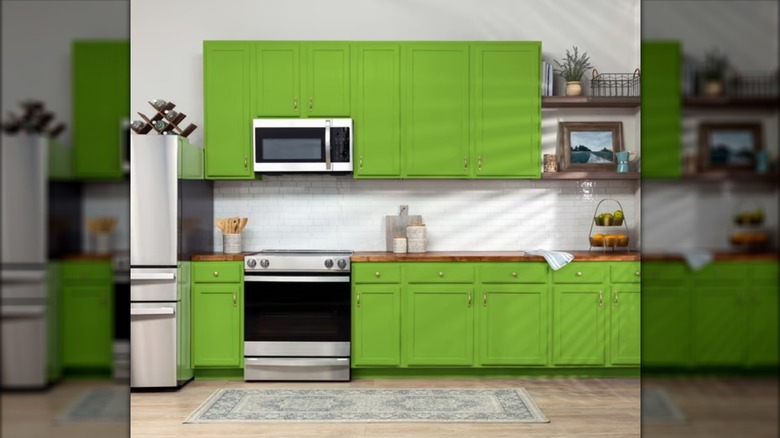 Kitchen with apple green cabinets