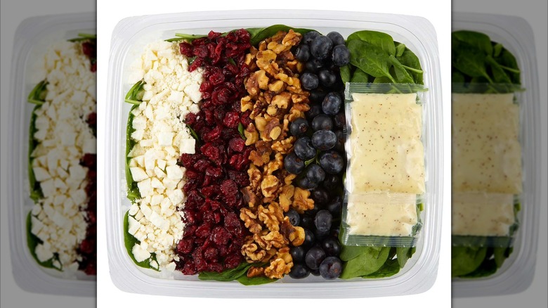 Tray of layered berry granola salad