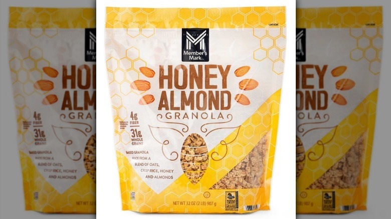 Honey almond granola on white background