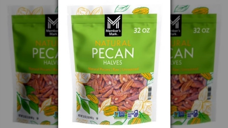 Pecan halves on white background