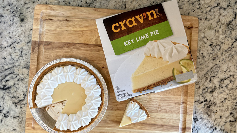 Overhead view of a sliced Crav'n brand pie