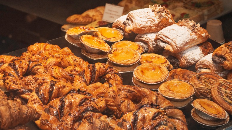 an assortment of baked goods on display