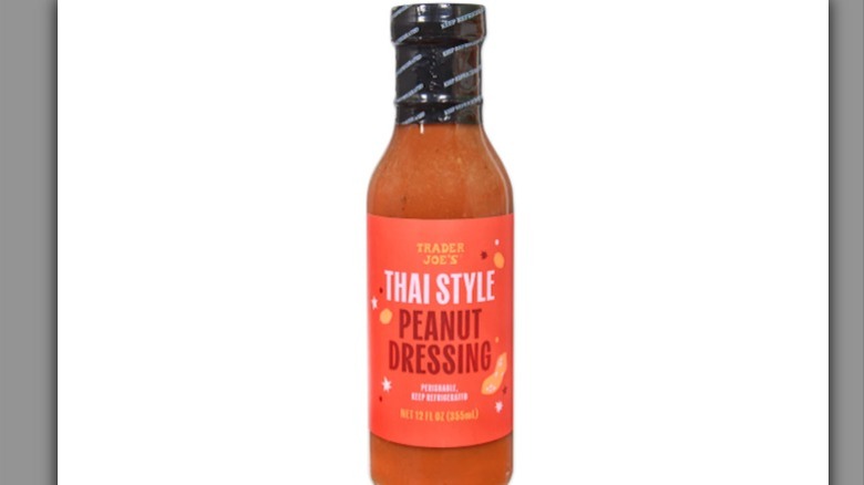 Bottles of Trader Joe's Thai Style Peanut Dressing on the shelf