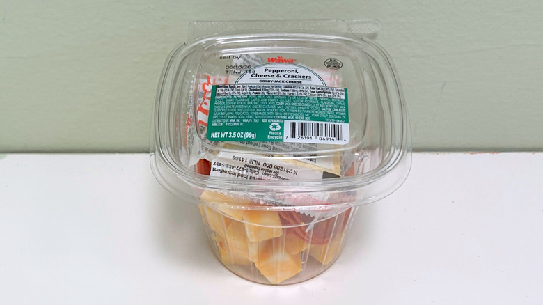 A plastic container of Wawa Pepperoni and Cheese with Crackers