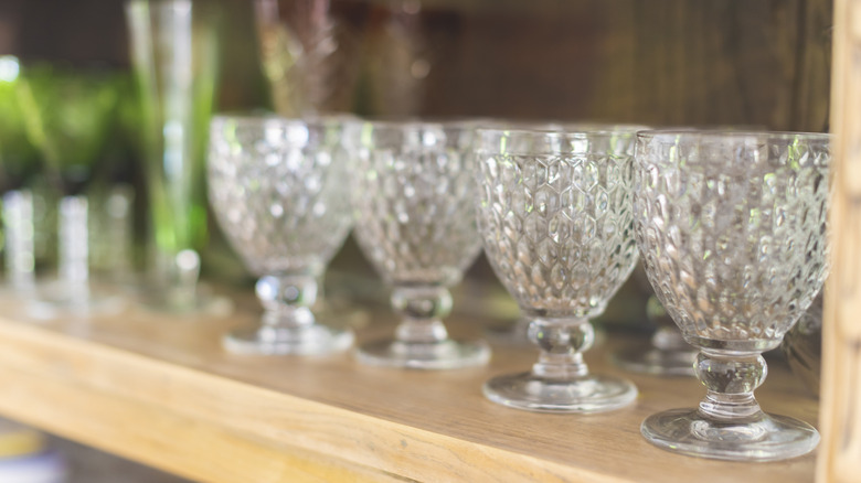 pretty glassware on shelf