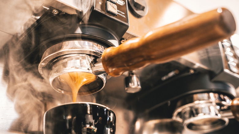 Steaming espresso pull shot from below