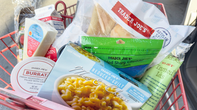 shopping cart full of trader joes groceries