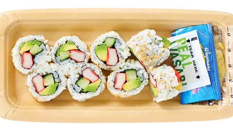 8 sushi pieces with white rice, avocado, and crab meat