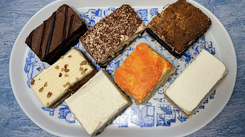 selection of cake slices arranged on platter