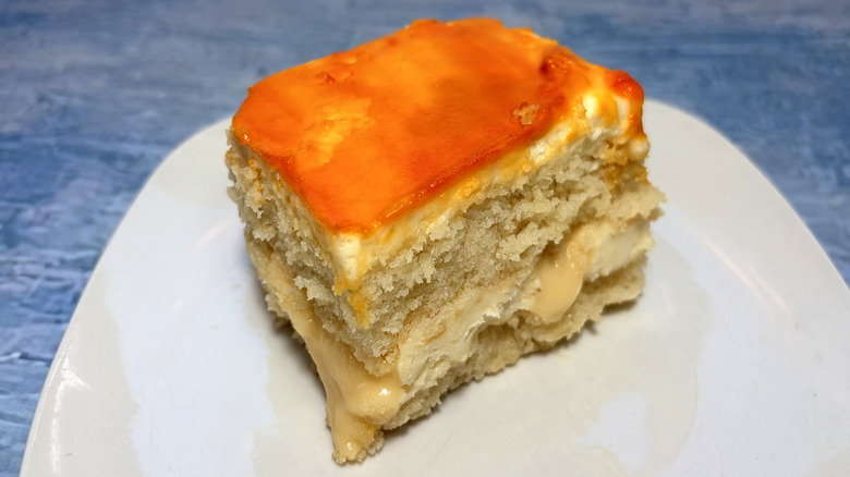slice of two layer mango cake