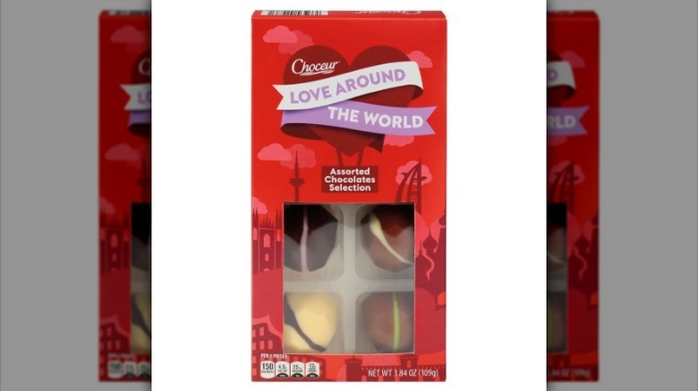 Assorted chocolates on white background