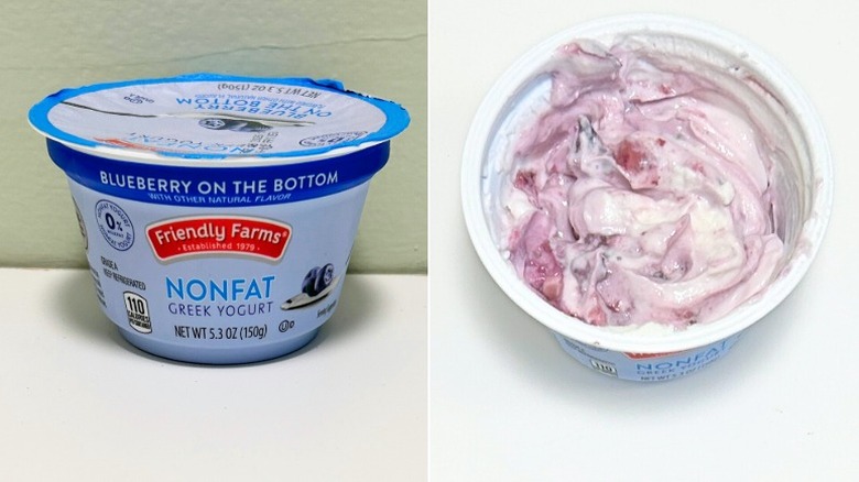A tub of Friendly Farms Blueberry On The Bottom Nonfat Greek Yogurt next to blueberry yogurt
