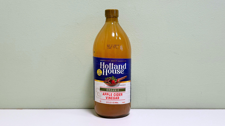A bottle of Holland House Organic Apple Cider Vinegar