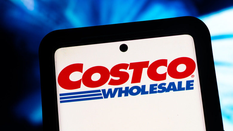 A Costco Wholesale logo is displayed on a phone or tablet