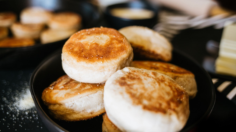Close-up of a bowl of sourdough biscuits on a countertop