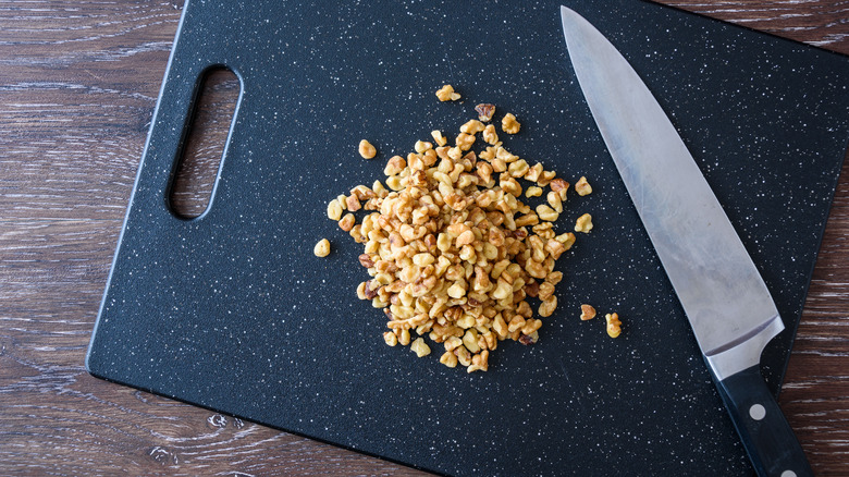 chopped nuts on cutting board