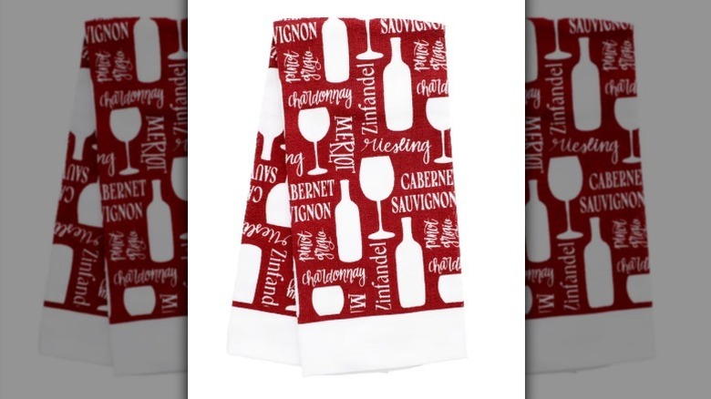 Wine themed kitchen towel on white background