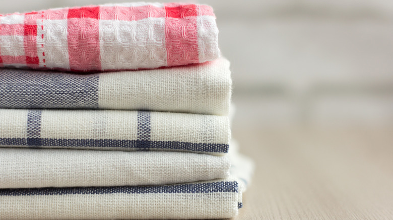 Stack of folded kitchen towels