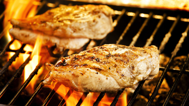 Chicken pieces on a grill