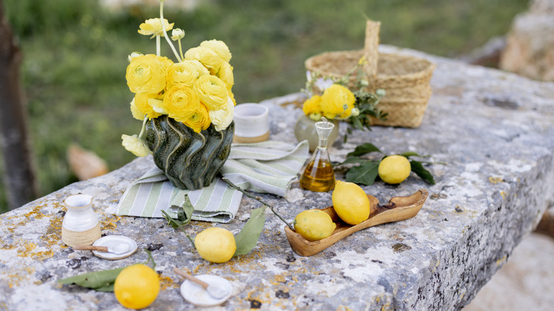 Table with lemons and olive oil