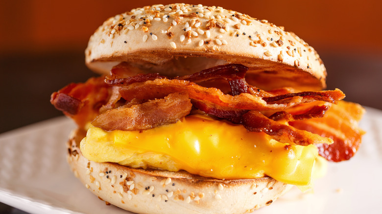 Bagel, egg, cheese, and bacon sandwich