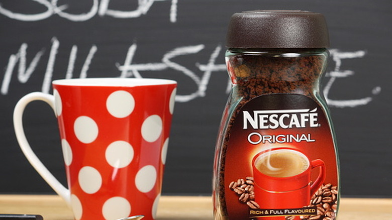Jar of Nescafe and mug