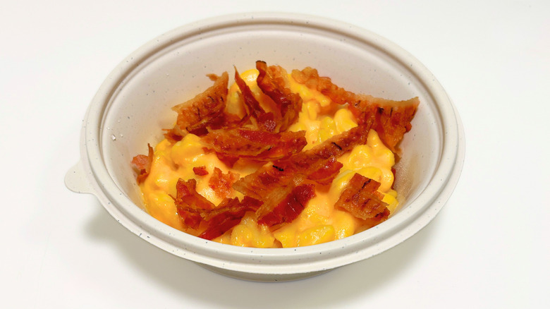 A Wawa Applewood Smoked Bacon Macaroni and Cheese Bowl on a white surface