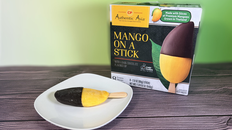 Chocolate dipped mango on stick with package