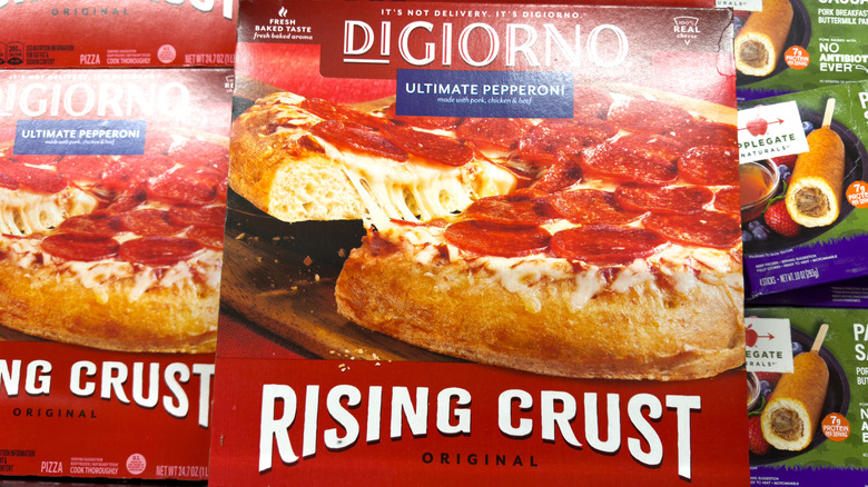 Box of DiGiorno rising crust pizza in freezer aisle