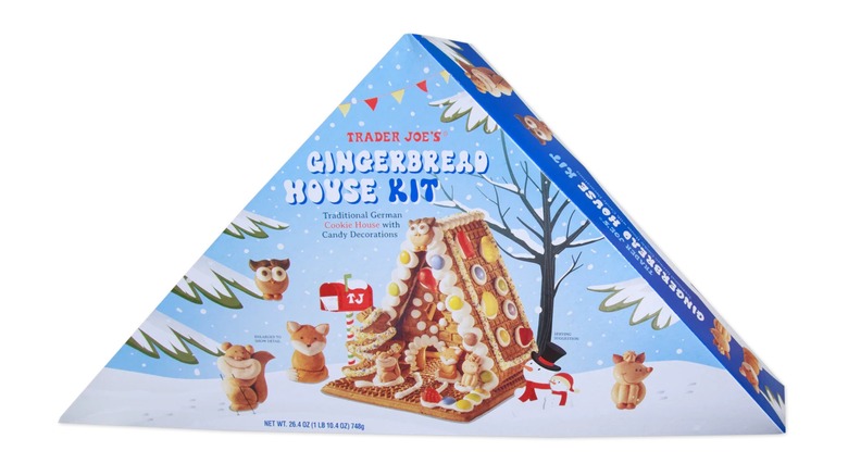 A triangular blue box for Trader Joe's Gingerbread House Kit