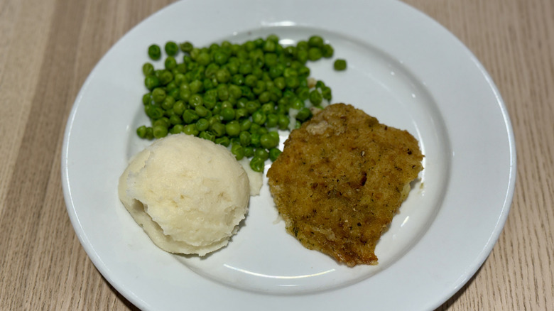 IKEA's garlic lemon cod with sides on a white plate