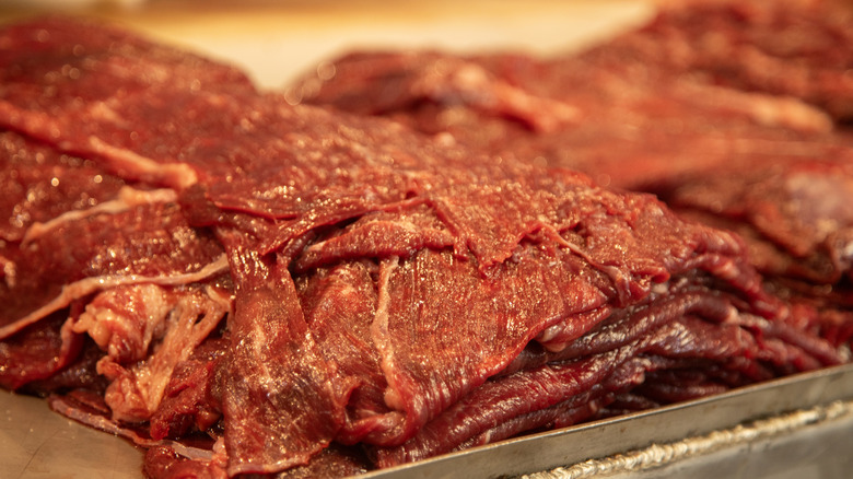 Sliced, pre-seasoned beef pieces