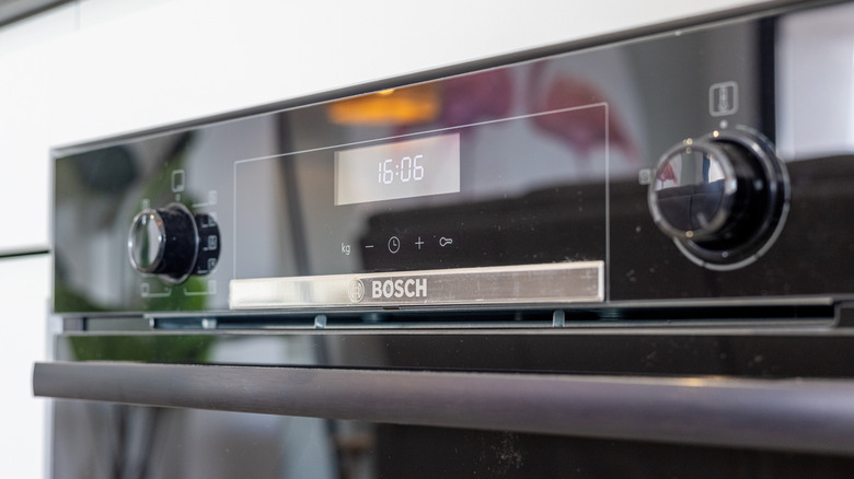 close-up shot of bosch oven displaying the time