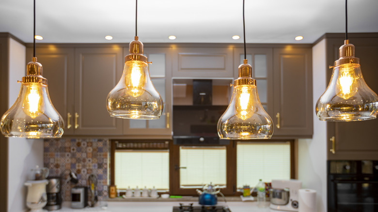 Vintage pendant lights hanging in kitchen