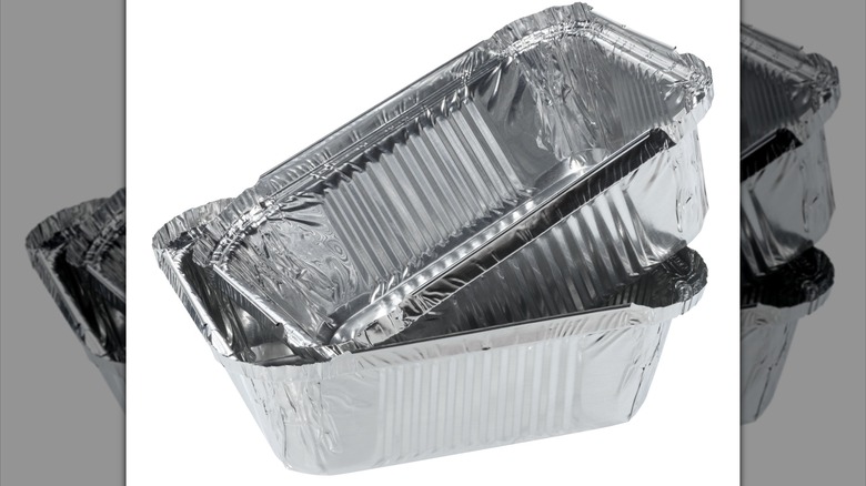 Foil baking pans stacked on top of one another