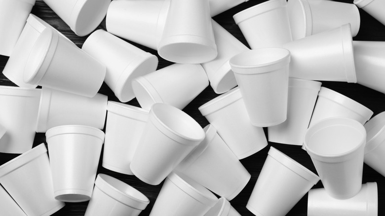 A pile of white styrofoam cups