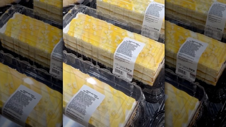 Line of peaches and cream bar cakes at Costco.
