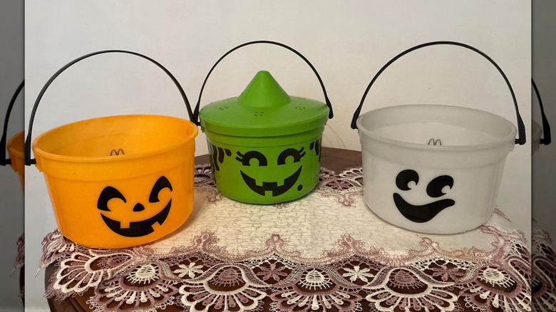 Three McDonald's Halloween Boo Buckets on a table