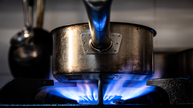 Flames on gas stove top