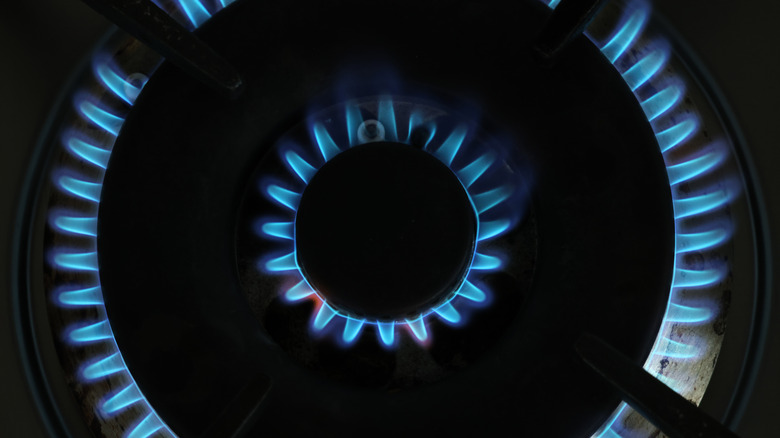 Blue flames on gas stove