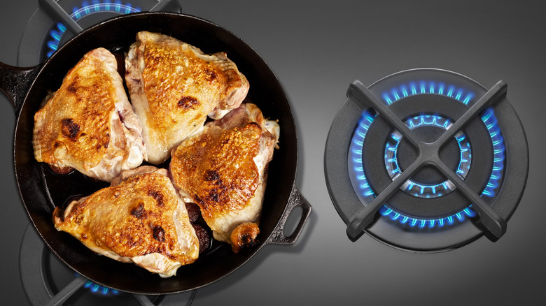 Skillet over two gas burners