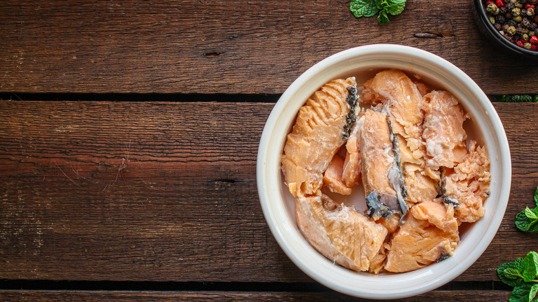 salmon in bowl on table
