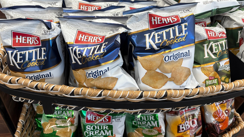 Bags of Herr's potato chips piled into baskets at Wawa