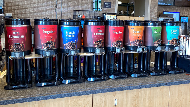 Wawa coffee cannisters lined up in a row on the counter