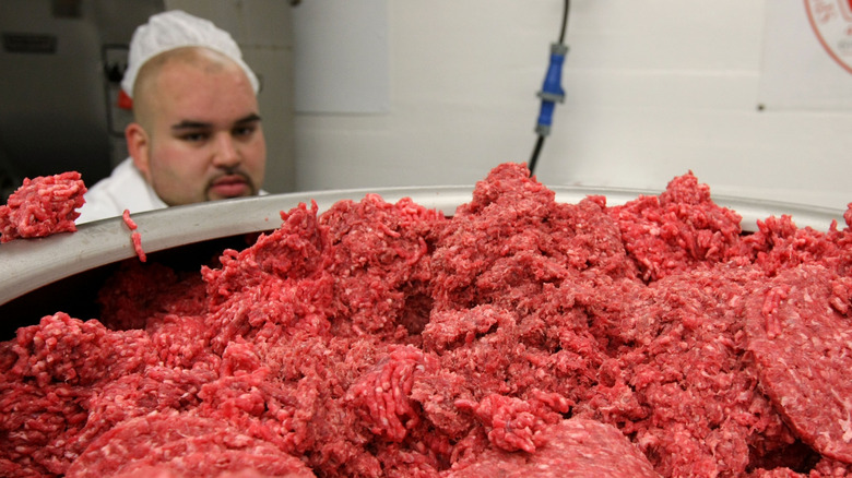 Ground beef being processed in plant