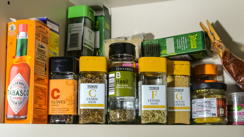 View of a crowded spice cupboard