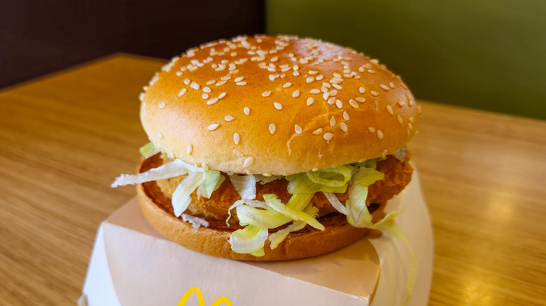 A McDonald's McChicken on top of its box