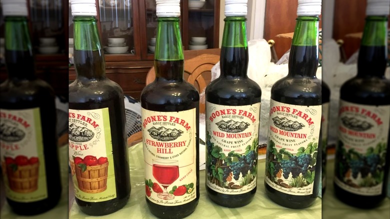 Bottles of various flavors of Boone's Farm fruit wines