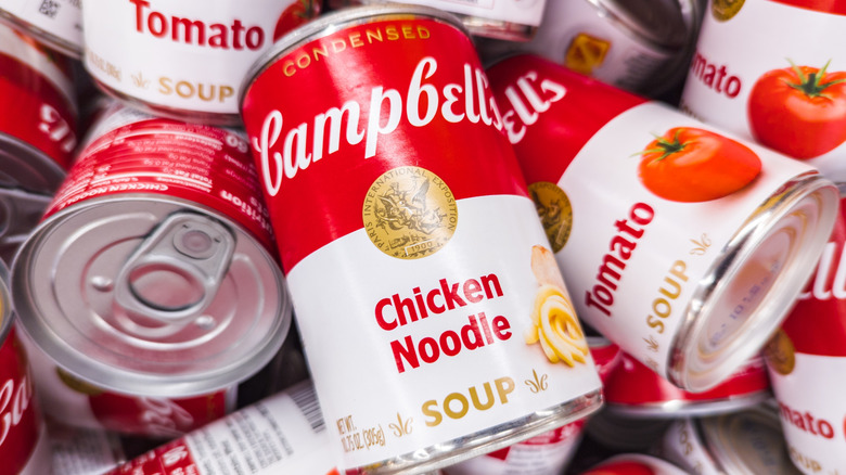 A pile of canned Campbell's soups